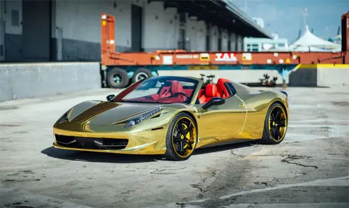 CLASS: Ronaldo Shakes Up the Streets of Arabia Behind the Wheel of a Gold-Plated Ferrari 488 GTB 7